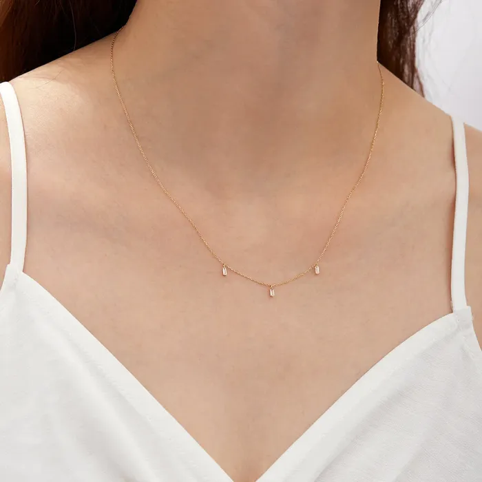 Marina Floating Triple Baguette White Sapphire Necklace Aurelie Gi Necklaces Marina Floating Triple Baguette White Sapphire Necklace Aurelie Gi Necklaces