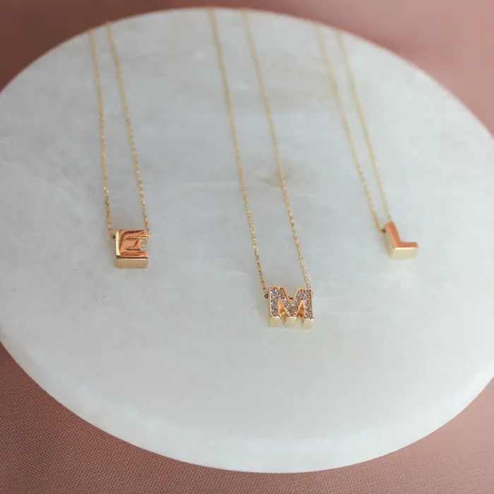 Gold necklace with the letter M and sparkling zircons Senso Gold Symbols Senso Gold Necklaces Gold necklace with the letter M and sparkling zircons Senso Gold Symbols Senso Gold Necklaces